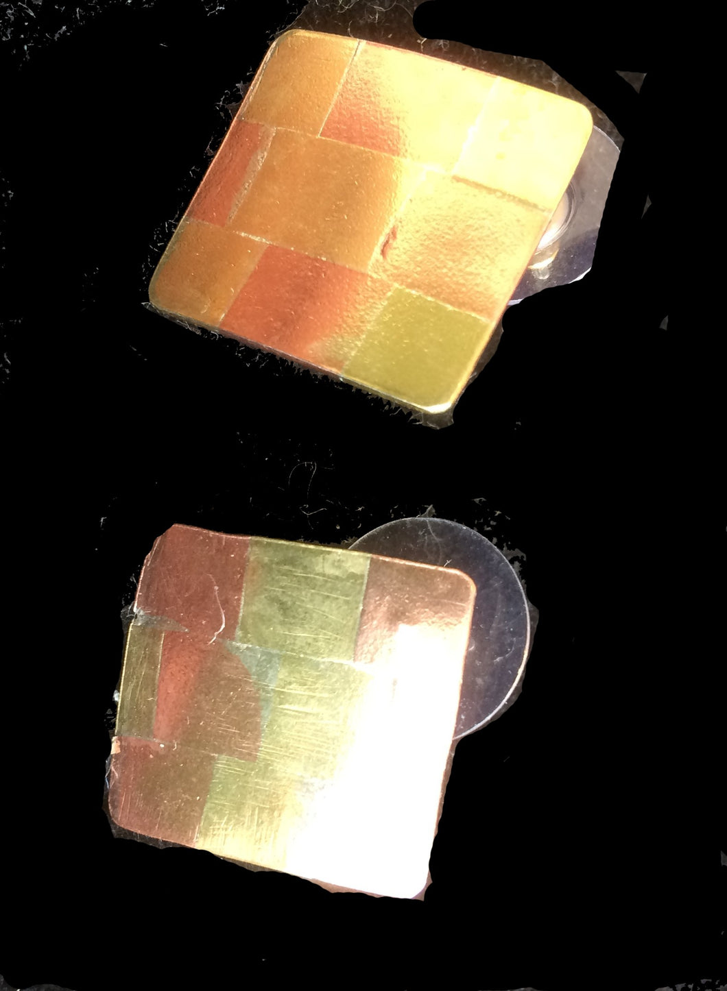 Earrings of copper and brass